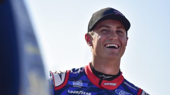 Zane Smith shares a laugh on the grid during qualifying for the NASCAR Camping World Truck Series Toyota 200 at WWT Raceway on June 3, 2022, in Madison, Illinois.