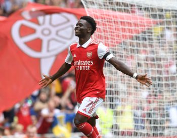 Arsenal attacker Bukayo Saka celebrates scoring a goal.