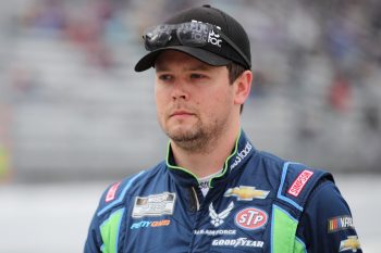 Erik Jones walks the grid during practice for the NASCAR Cup Series Blue-Emu Maximum Pain Relief 400 at Martinsville Speedway on April 8, 2022 in Martinsville, Virginia.