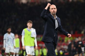 Manchester United manager Erik ten Hag gestures to the crowd after defeating Liverpool.