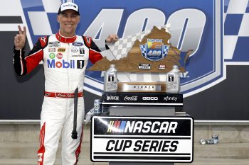 Kevin Harvick celebrates after winning the NASCAR Cup Series Federated Auto Parts 400 at Richmond Raceway on Aug. 14, 2022, in Richmond, Virginia.