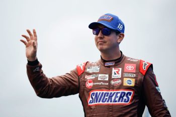 Kyle Busch waves to the crowd at Watkins Glen.