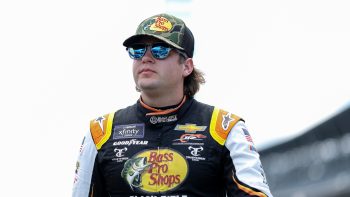 Noah Gragson walks the grid during practice for the NASCAR Xfinity Series Pennzoil 150 at the Brickyard at Indianapolis Motor Speedway on July 29, 2022.