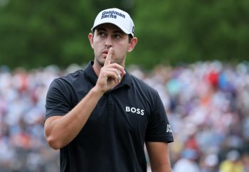 Patrick Cantlay quiets the crowd at the BMW Championship.