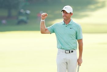 Rory McIlroy celebrates after winning the 2022 Tour Championship.