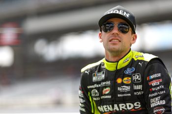 Ryan Blaney waits on the grid prior to the NASCAR Cup Series Verizon 200 at the Brickyard at Indianapolis Motor Speedway on July 31, 2022.