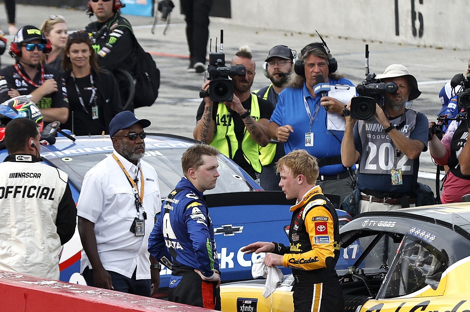 William Byron and Ty Gibbs talk after the NASCAR Xfinity Series Sunoco Go Rewards 200 at The Glen at Watkins Glen International on Aug. 20, 2022. | Sean Gardner/Getty Images