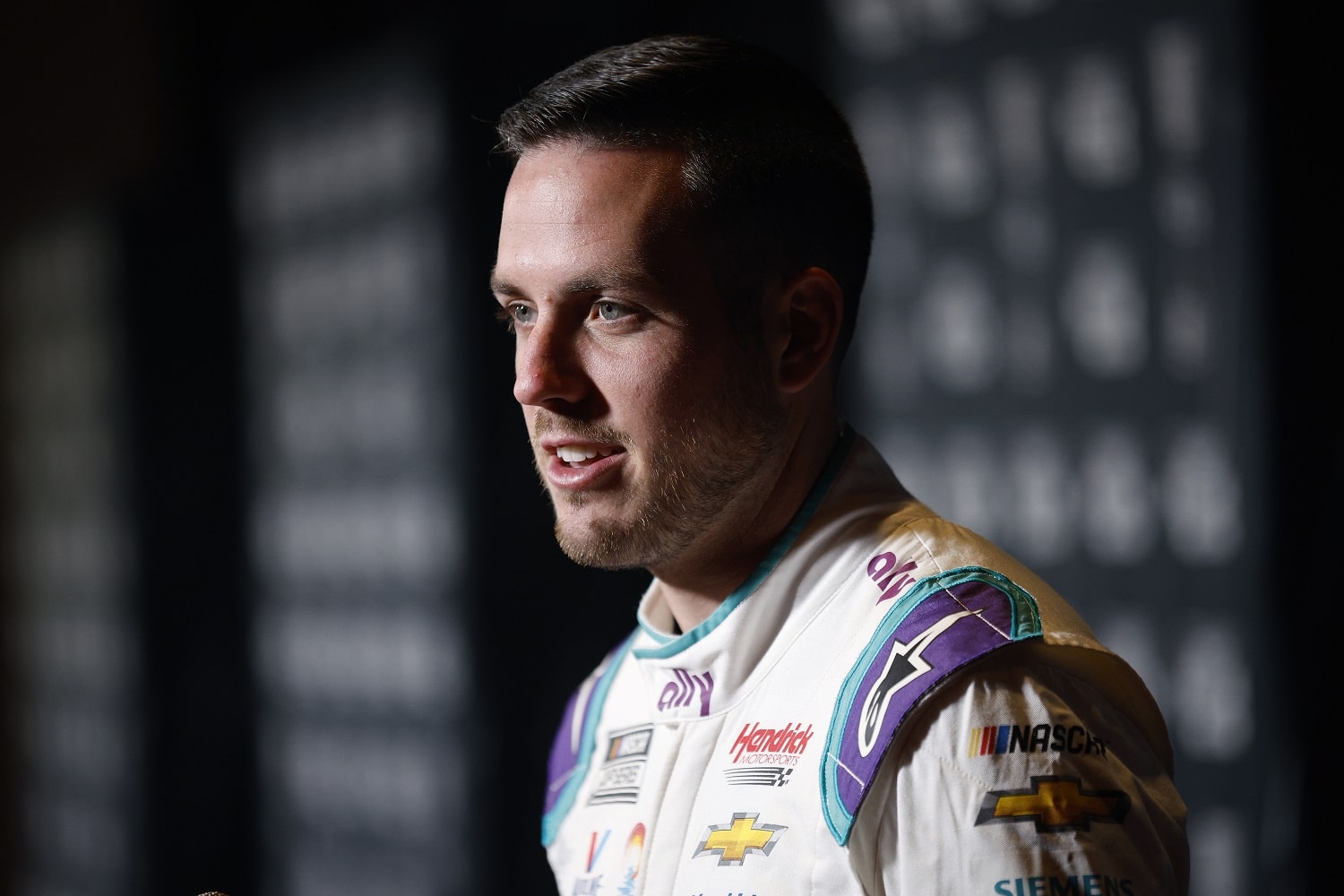 Hendrick Motorsports driver Alex Bowman speaks with reporters during the NASCAR Cup Series Playoff Media Day at Charlotte Convention Center on Sept. 1, 2022 in Charlotte, North Carolina. | Jared C. Tilton/Getty Images