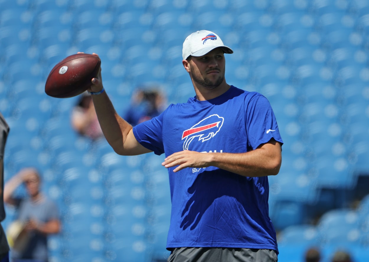 Josh Allen warms up before a preseason game.