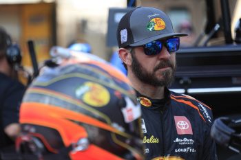 Martin Truex Jr. talks with reporters during qualifying for the NASCAR Cup Series Playoff Bass Pro Shops NRA Night race on Sept. 16, 2022 at Bristol Motor Speedway.