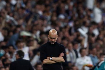 Manchester City manager Pep Guardiola reacts during a Champions League defeat.