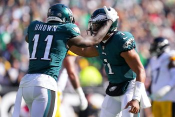 A.J. Brown and Jalen Hurts celebrate after a touchdown.