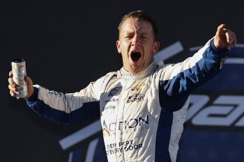 AJ Allmendinger celebrates after winning the NASCAR Xfinity Series Sparks 300 at Talladega Superspeedway on Oct. 1, 2022, in Talladega, Alabama.