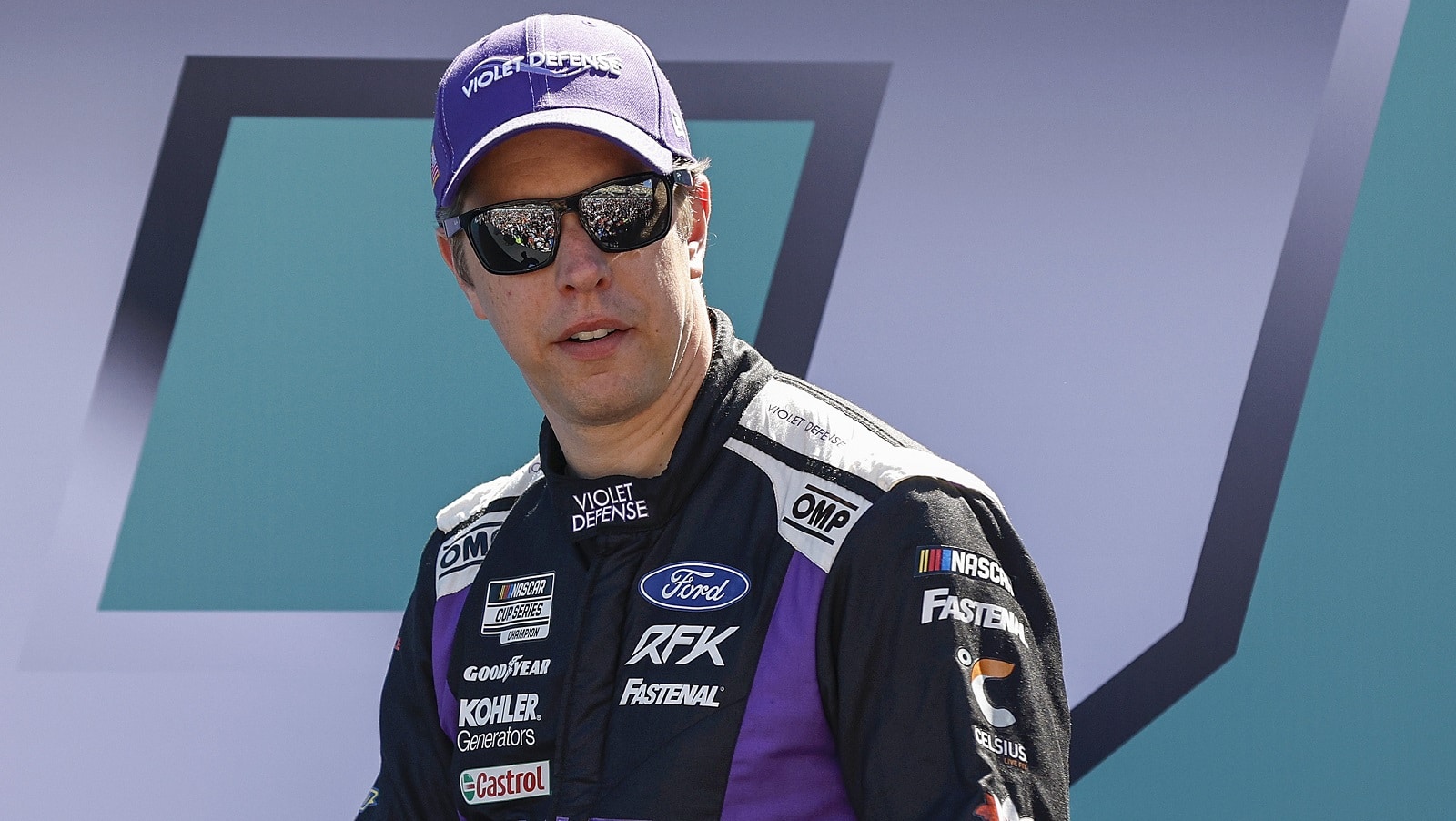 Brad Keselowski walks onstage during driver intros for the NASCAR Cup Series Dixie Vodka 400 at Homestead-Miami Speedway on Oct. 23, 2022. | Sean Gardner/Getty Images