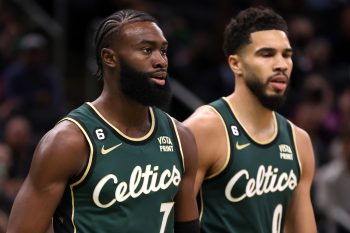 Jaylen Brown of the Boston Celtics and Jayson Tatum look on during the first half against the Philadelphia 76ers.