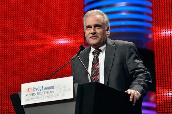 Martinsville Speedway president Clay Campbell stands at the podium in 2015.