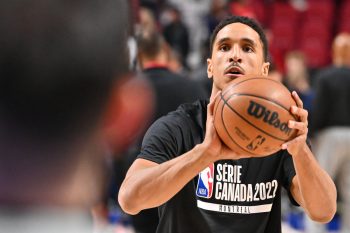 Malcolm Brogdon of the Boston Celtics takes part in warmups.