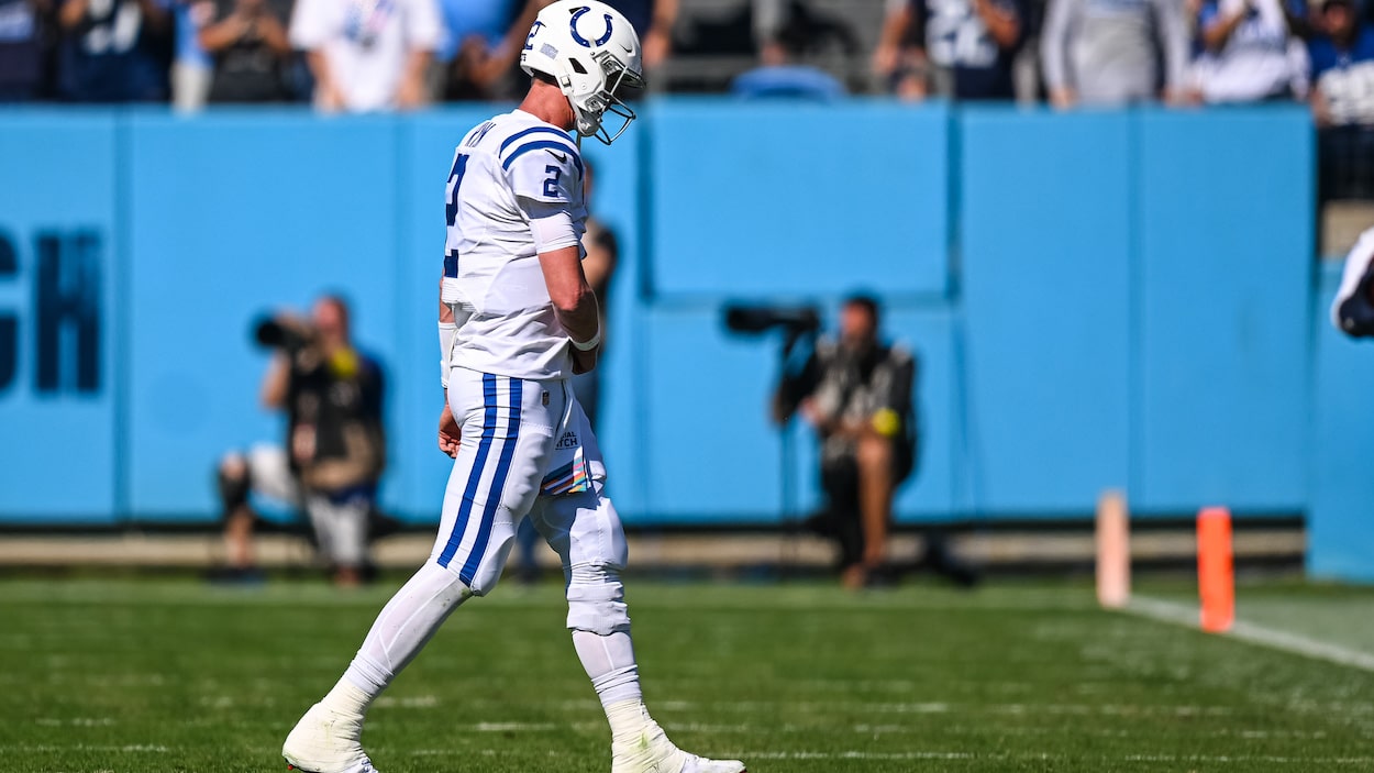 Indianapolis Colts quarterback Matt Ryan walks off the field. He will be replaced by Sam Ehlinger in Week 8.