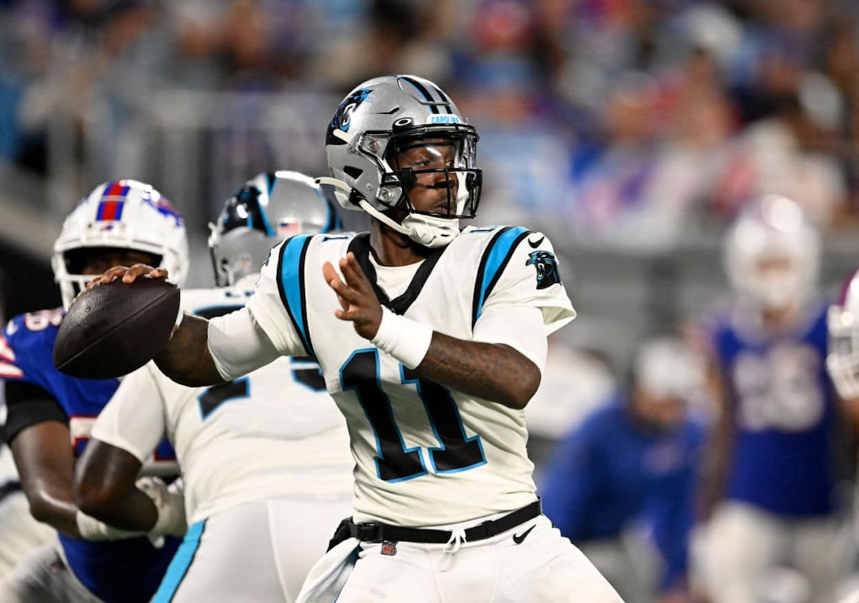 PJ Walker throws a pass for the Carolina Panther