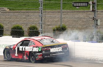 Ross Chastain rides the wall on the final lap of the NASCAR Cup Series Xfinity 500 at Martinsville Speedway on Oct. 30, 2022.