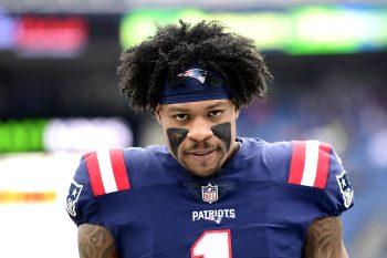 N'Keal Harry of the New England Patriots looks on during warmups.