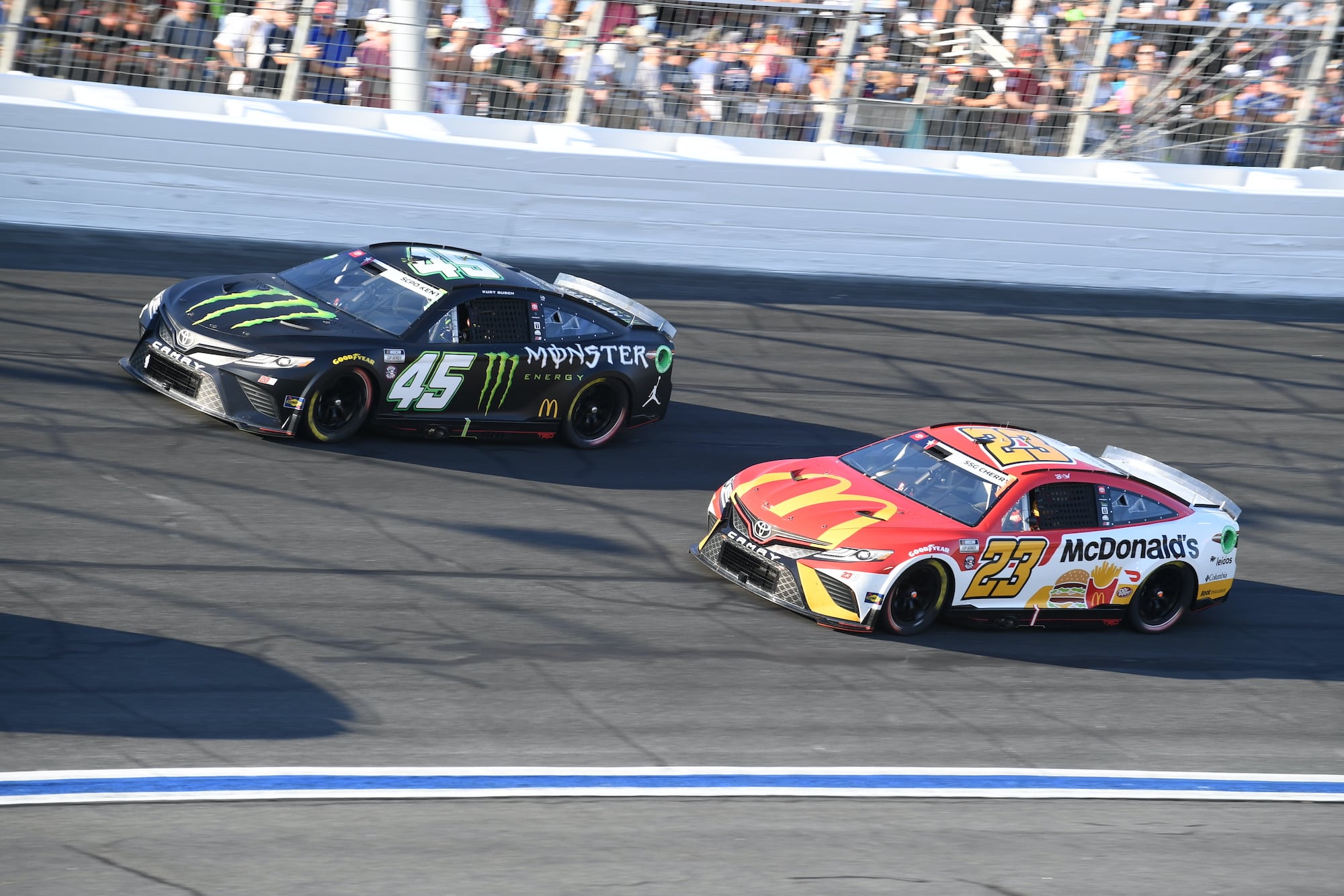 23XI Racing teammates Bubba Wallace and Kurt Busch race