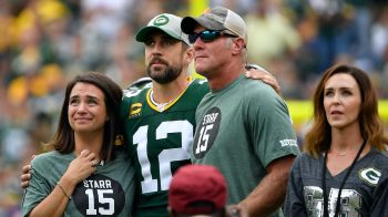 Former Green Bay Packers and New York Jets QBs Aaron Rodgers and Brett Favre in 2019.