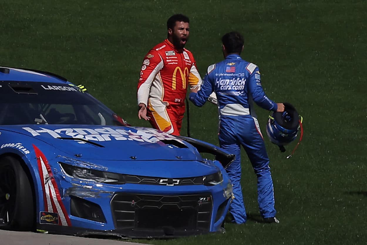 Bubba Wallace (L) and Kyle Larson (R) exchange words.