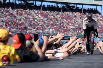 NASCAR fans greet driver