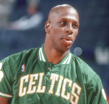 Xavier McDaniel of the Boston Celtics looks on prior to the start of an NBA game against the Washington Bullets circa 1992.