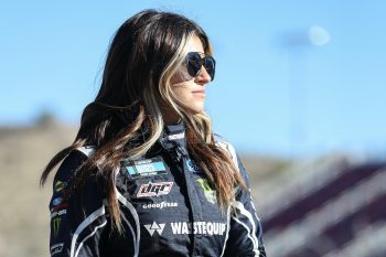 Hailie Deegan waits on grid