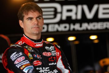 Jeff Gordon looks on in the garage during practice for the Daytona 500 at Daytona International Speedway on Feb. 22, 2012.