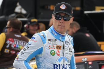 Kevin Harvick looks on at race