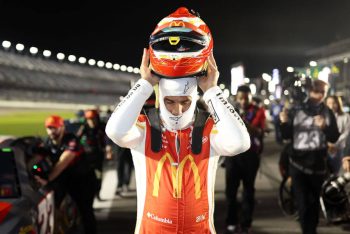 Bubba Wallace dons his helmet ahead of the Busch Light Pole at Daytona International Speedway.