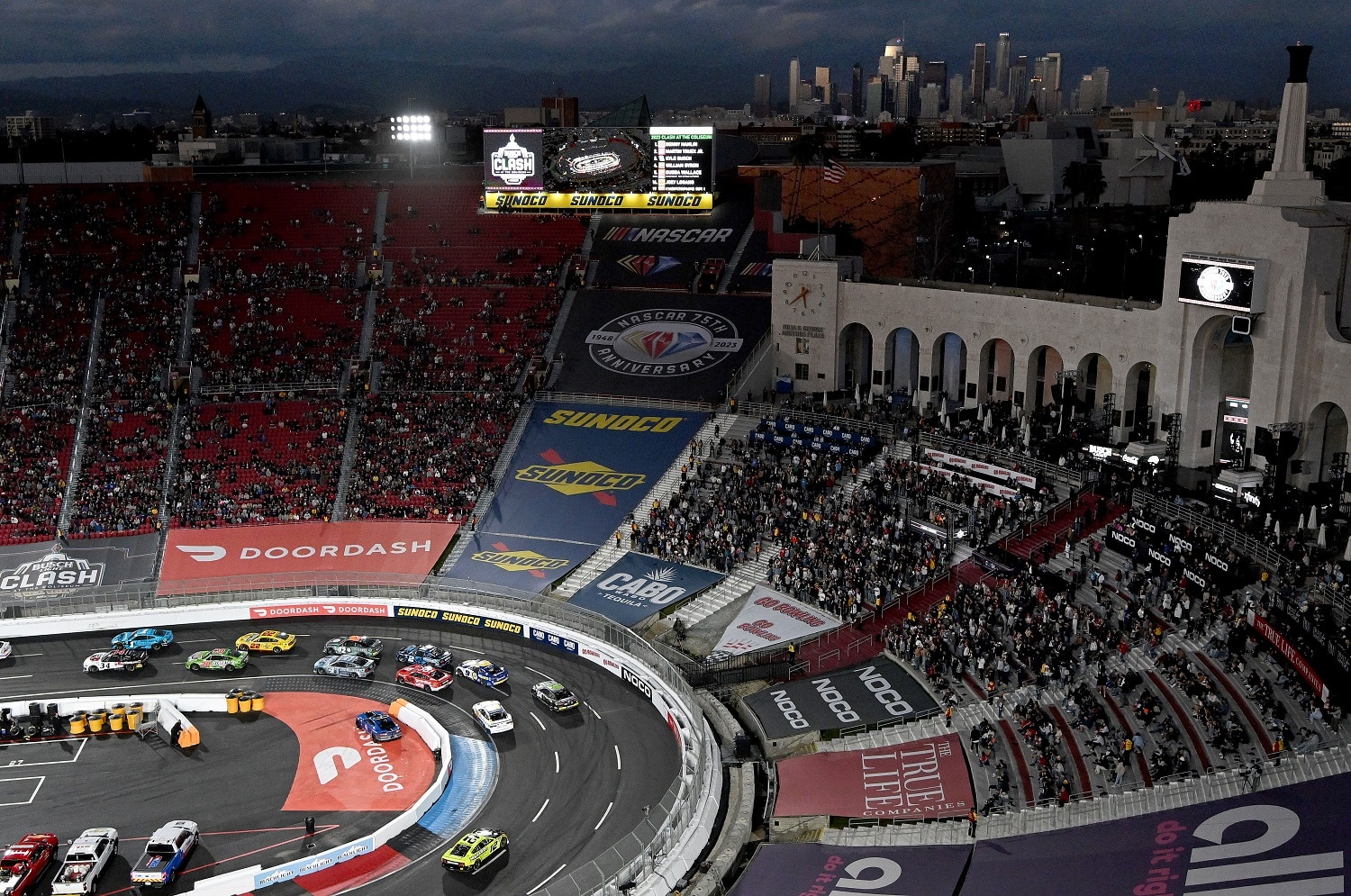 Drivers navigate the oval during the early laps of the NASCAR Busch Light Clash at the Los Angeles Memorial Coliseum on Feb. 5, 2023. |  Will Lester/MediaNews Group/Inland Valley Daily Bulletin via Getty Images