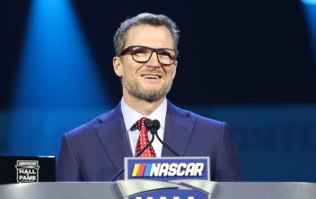 NASCAR Hall of Famer Dale Earnhardt Jr. speaks prior to inducting Kirk Shelmerdine during the NASCAR Hall of Fame Induction Ceremony at Charlotte Convention Center on Jan. 20, 2023.