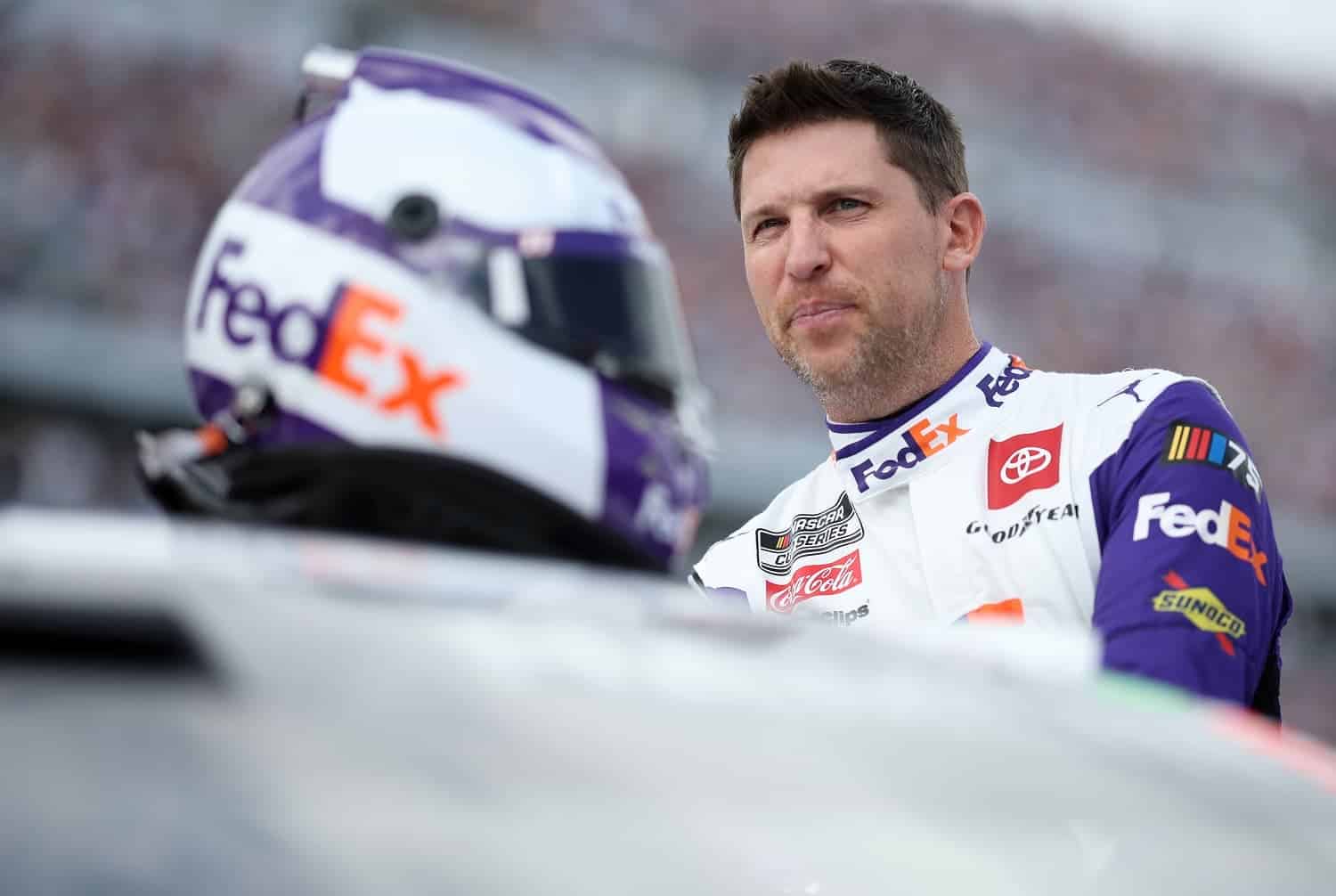 Denny Hamlin waits on the grid prior to the Daytona 500 on Feb. 19, 2023. | James Gilbert/Getty Images