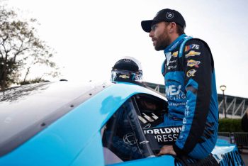 Ross Chastain enters his car ahead of Clash at the Coliseum qualifying.