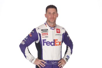 Driver Denny Hamlin poses for a photo during NASCAR Production Days at Charlotte Convention Center on Jan. 18, 2023 in Charlotte, North Carolina.