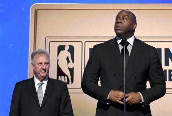 Larry Bird, left, and Magic Johnson accept the Lifetime Achievement Awards.