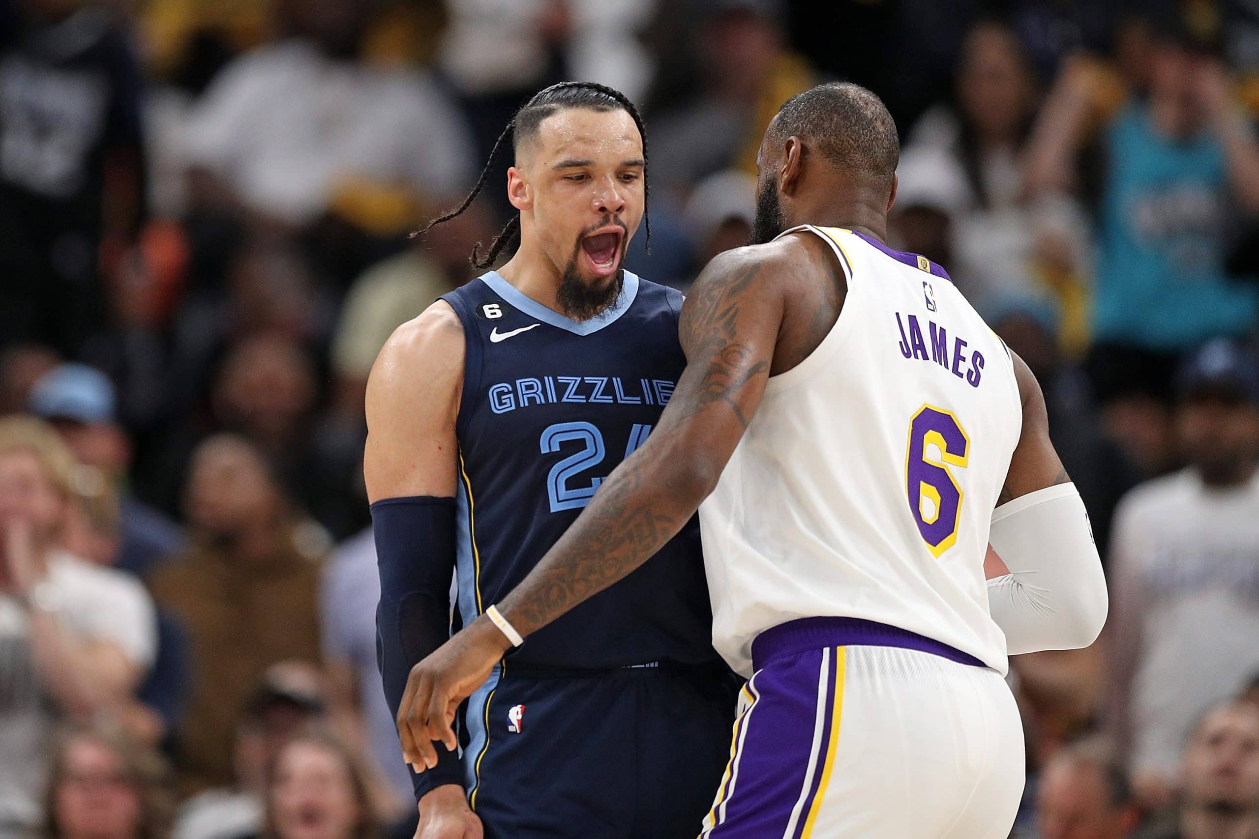 Dillon Brooks of the Memphis Grizzlies and LeBron James of the Los Angeles Lakers.