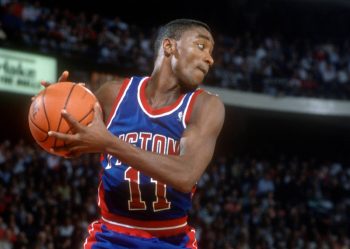 Isiah Thomas of the Detroit Pistons grabs a rebound against the Chicago Bulls.
