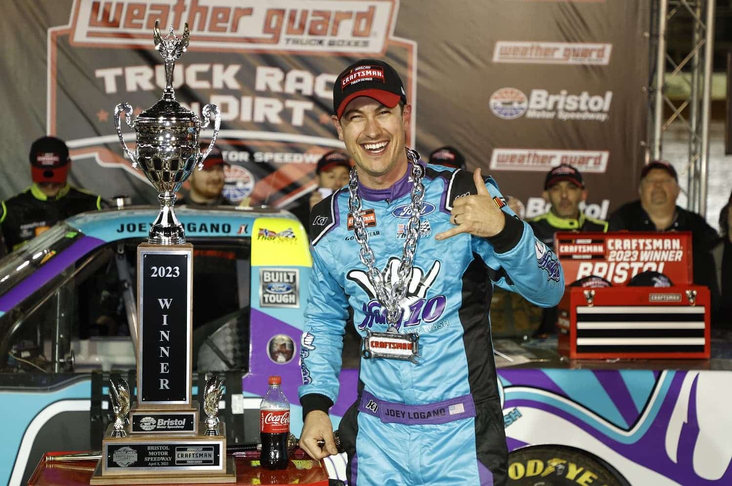 Joey Logano celebrates winning the NASCAR Craftsman Truck Series Weather Guard Truck Race on Dirt at Bristol Motor Speedway on April 8, 2023. | Jared C. Tilton/Getty Images