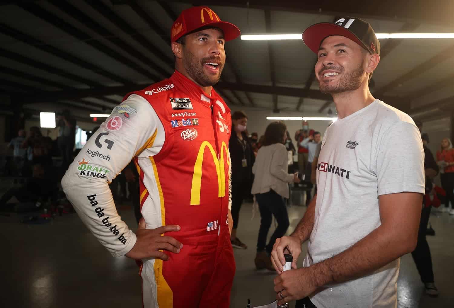 Bubba Wallace talks with Kyle Larson in Victory Lane after winning the rain-shortened NASCAR Cup Series YellaWood 500 at Talladega Superspeedway on Oct. 4, 2021. | Chris Graythen/Getty Images
