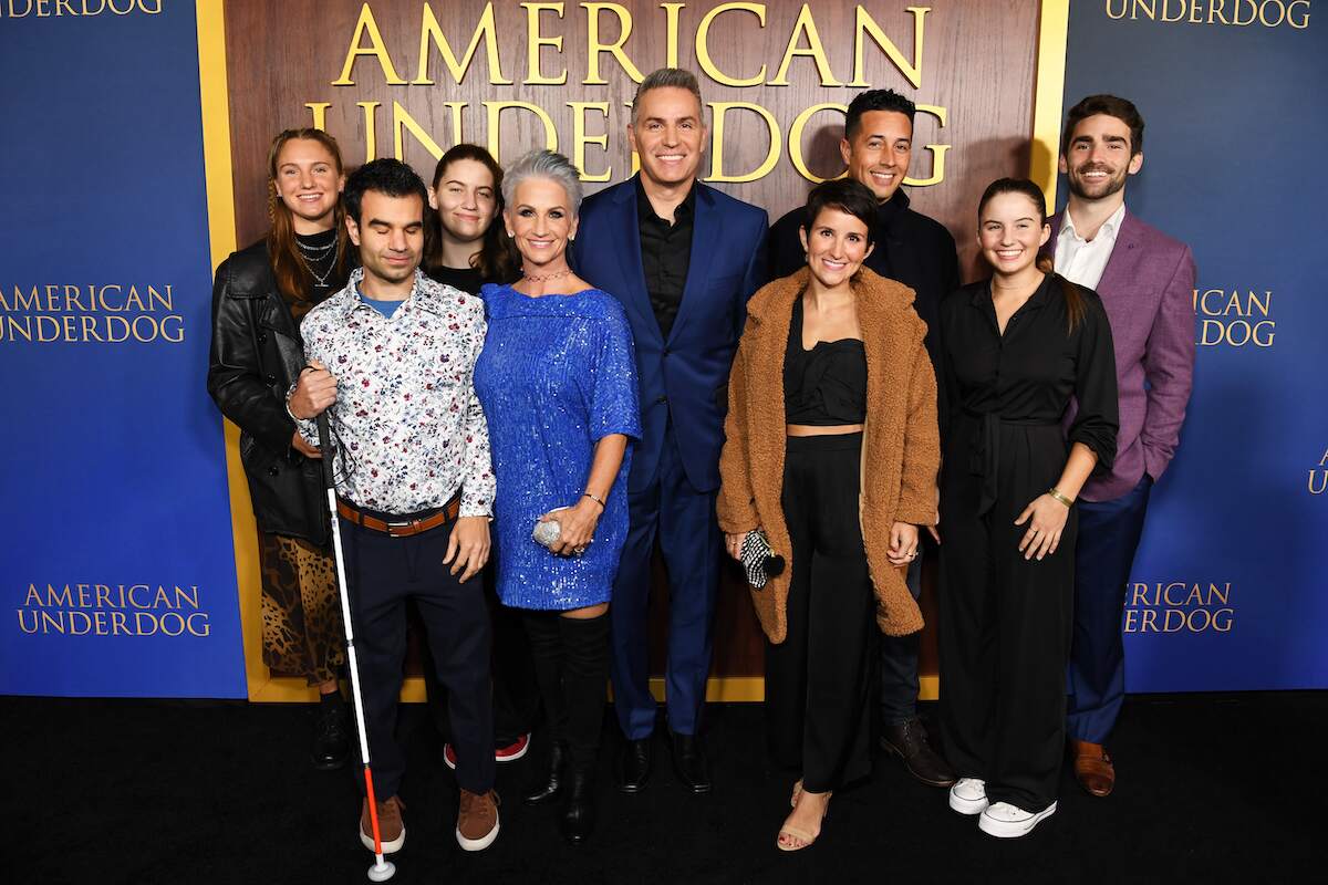 Kurt Warner, Brenda Warner, and their children smile at the American Underdog premiere