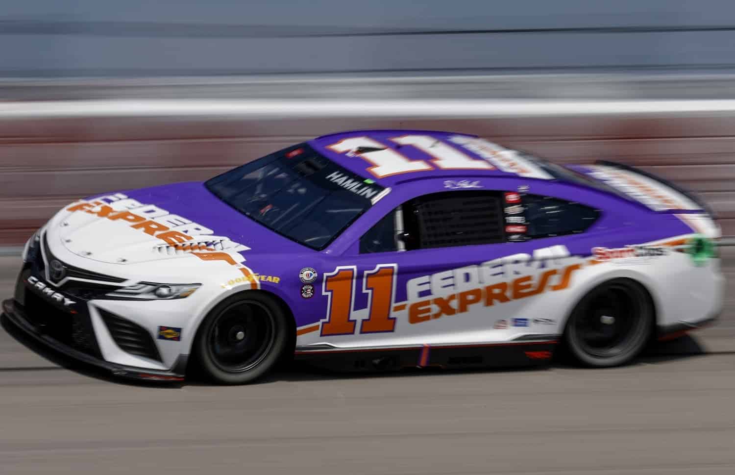 Denny Hamlin, driver of the No. 11 FedEx Toyota, drives during practice for the NASCAR Cup Series Goodyear 400 at Darlington Raceway on May 13, 2023.
