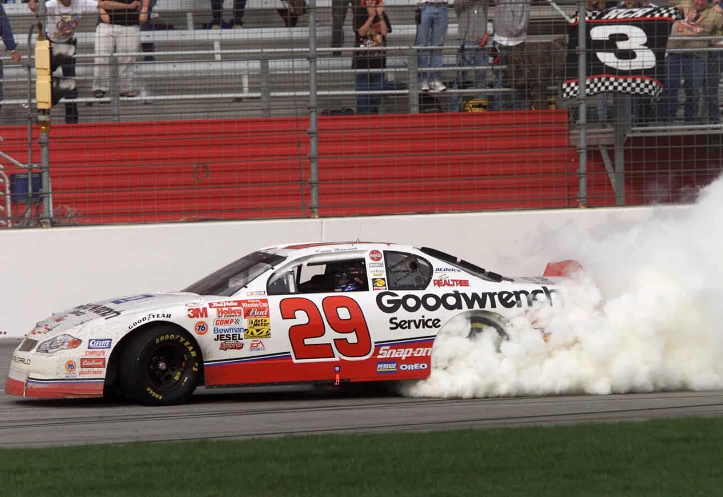 Kevin Harvick in the No. 29 Richard Childress Racing Chevrolet celebrates after winning the 2001 Cracker Barrel 500. | Jonathan Ferrey/ALLSPORT via Getty Images