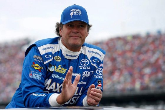 Michael Waltrip looks on during pre-race ceremonies at the NASCAR Sprint Cup Series CampingWorld.com 500 at Talladega Superspeedway on Oct. 25, 2015