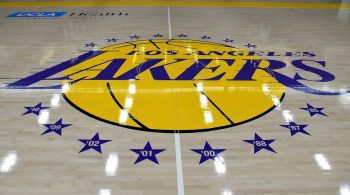 The Los Angeles Lakers logo is seen at center court at the team training facility