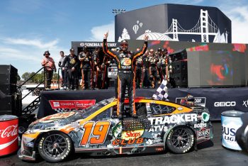 Martin Truex Jr. celebrates with his team after victory at Sonoma.